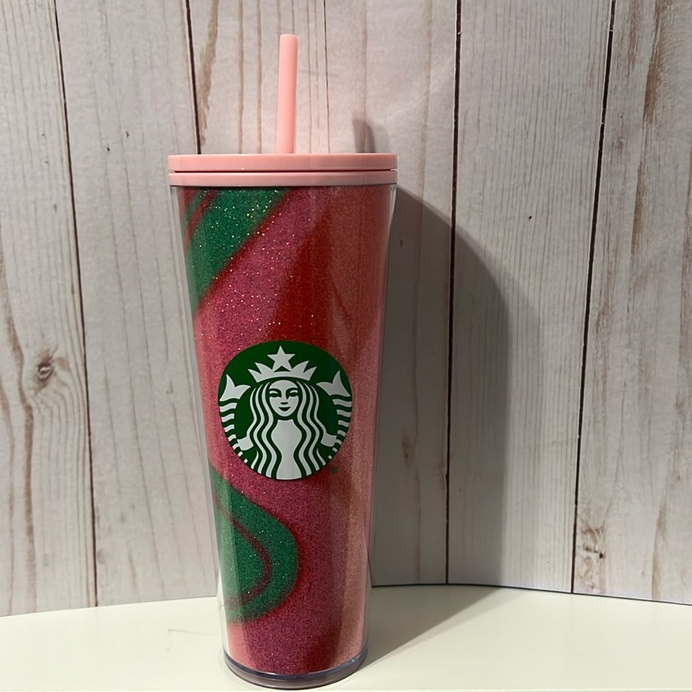 Red, pink and green swirl glitter cup with light pink lid and straw 24 oz